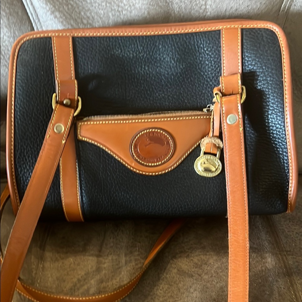 Dooney & Bourke Black and Tan Pebble Leather Bag. Double strap purse